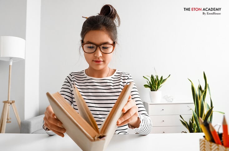 girl reading a book