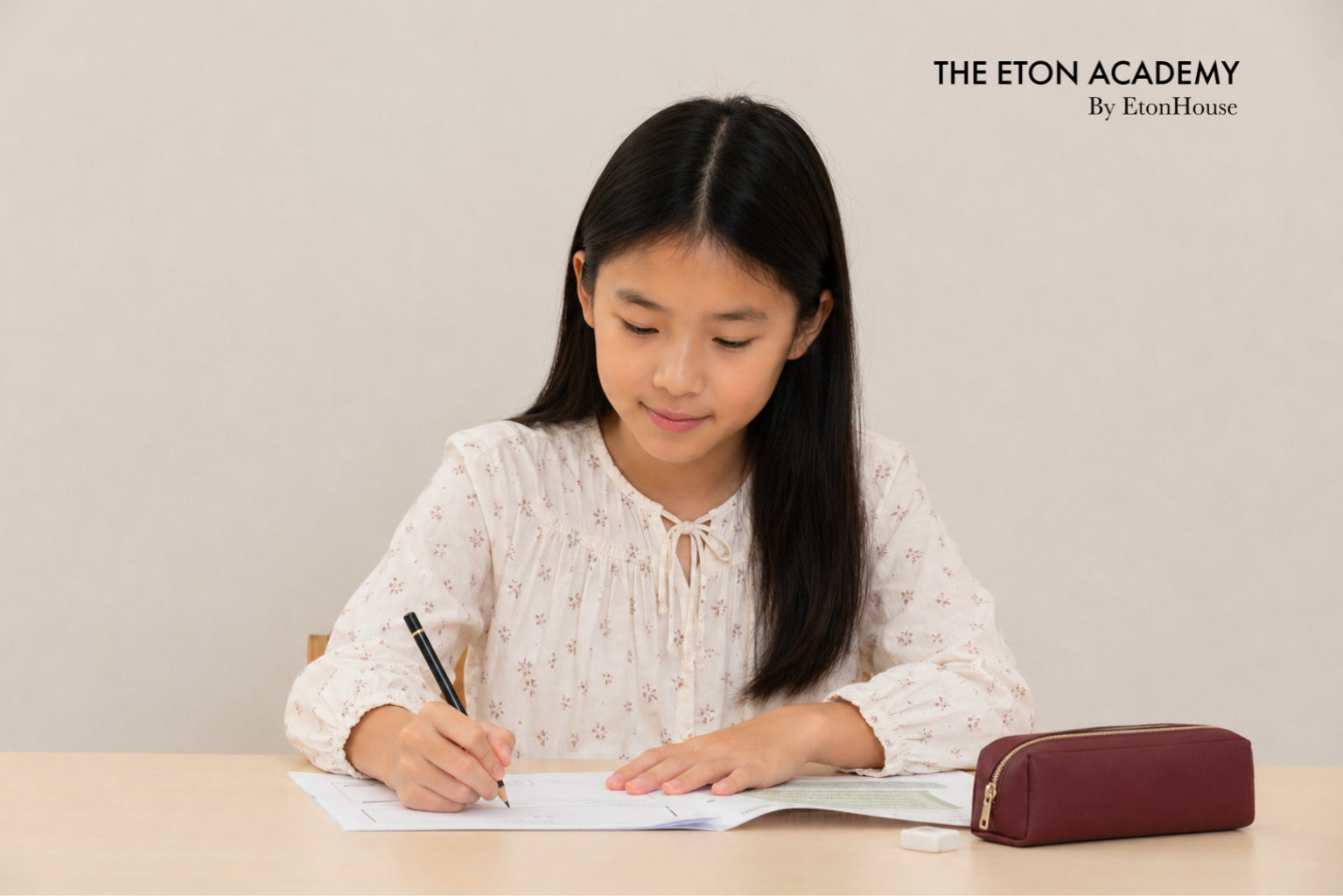 girl writing TEA
